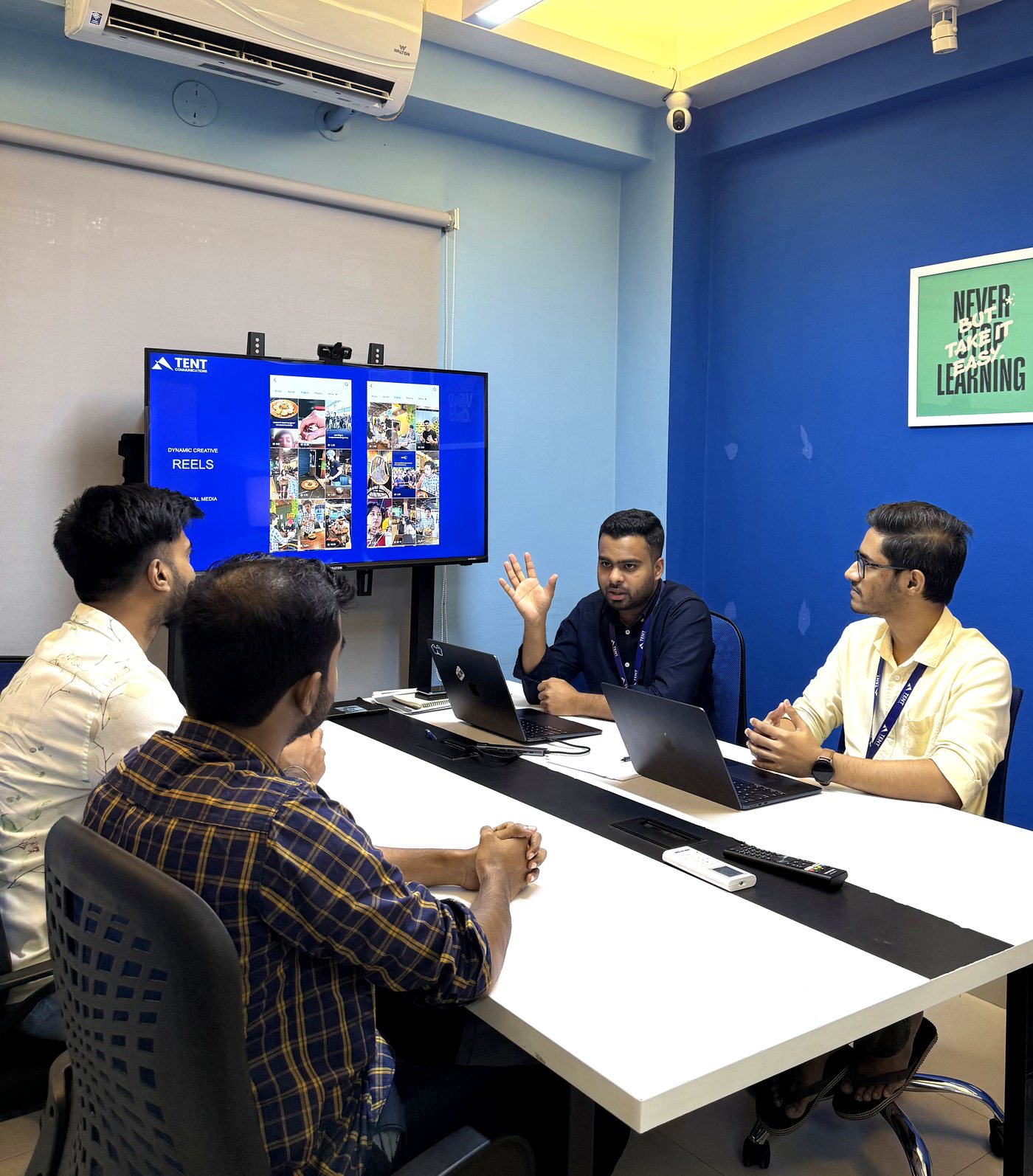 Tent Communications team in a strategy meeting at the office